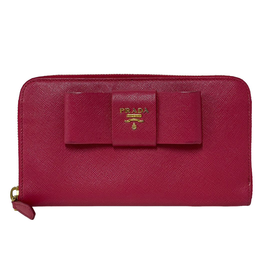 PRADA プラダ リボンモチーフ サフィアーノ ラウンドファスナー長財布 ピンク レイーディス 中古