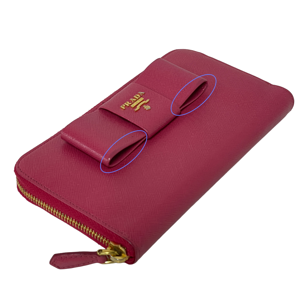 PRADA プラダ リボンモチーフ サフィアーノ ラウンドファスナー長財布 ピンク レイーディス 中古