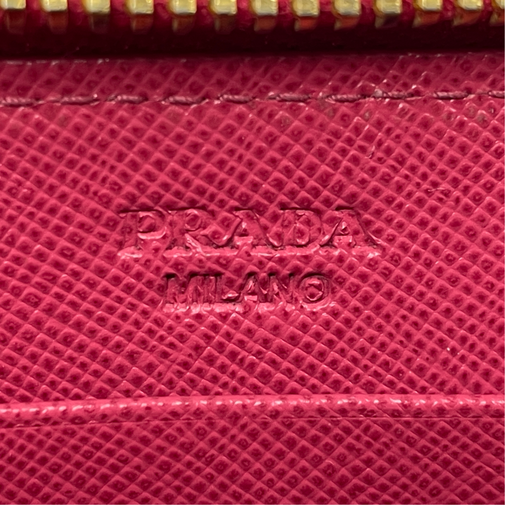 PRADA プラダ リボンモチーフ サフィアーノ ラウンドファスナー長財布 ピンク レイーディス 中古