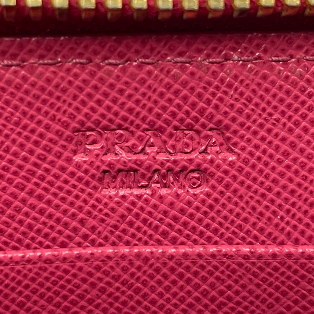 PRADA プラダ リボンモチーフ サフィアーノ ラウンドファスナー長財布 ピンク レイーディス 中古