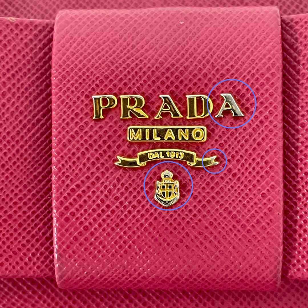 PRADA プラダ リボンモチーフ サフィアーノ ラウンドファスナー長財布 ピンク レイーディス 中古